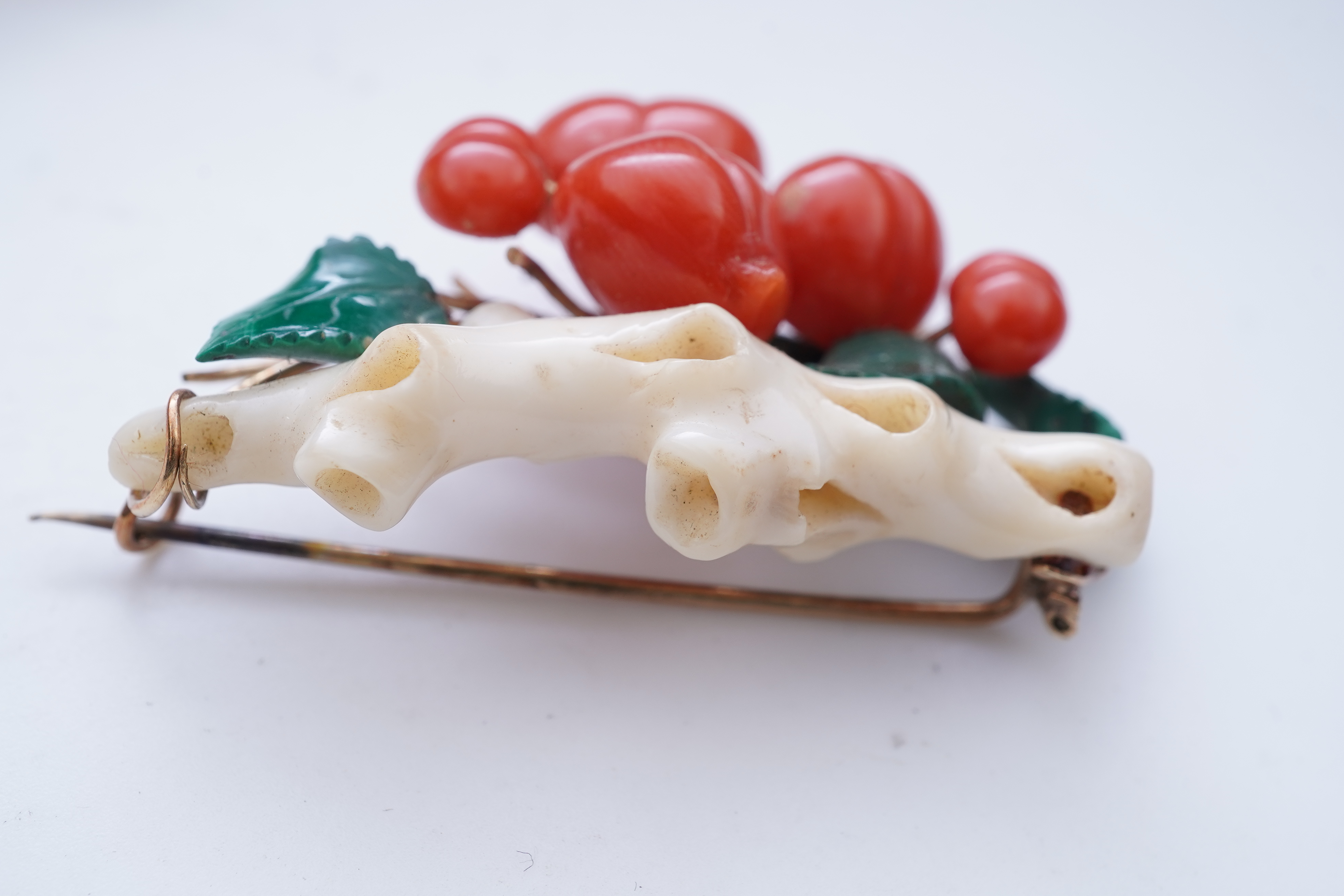 A rare coral and malachite demi-parure, mid 19th century and later